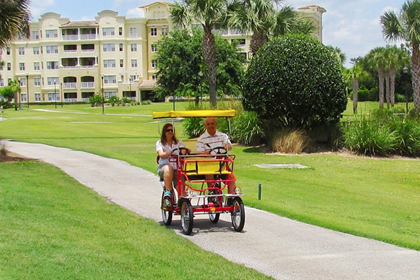 View of a Surrey bike on the Bike Path at the Omni Orlando ChampionsGate Resort 600