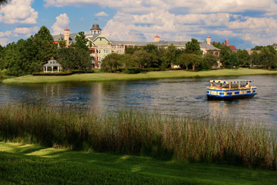 View of Saratoga Springs across the lake with a boat on the water