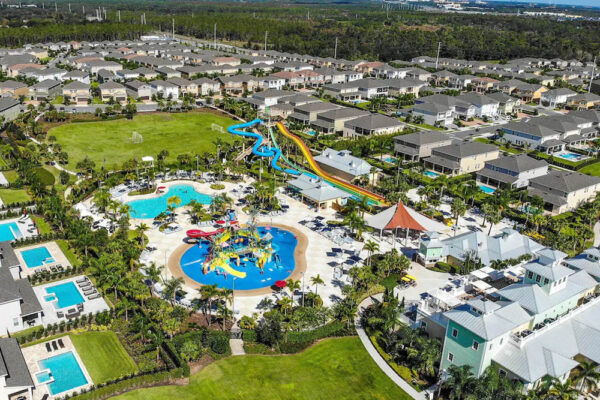 Aerial View of the water park, vacation homes, and clubhouse at the Encore Resort in Renunion Fl 1000