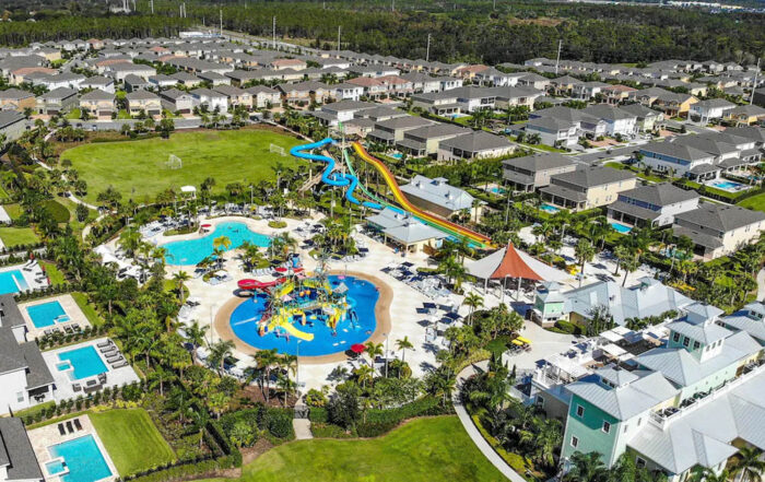 Aerial View of the water park, vacation homes, and clubhouse at the Encore Resort in Renunion Fl 1000