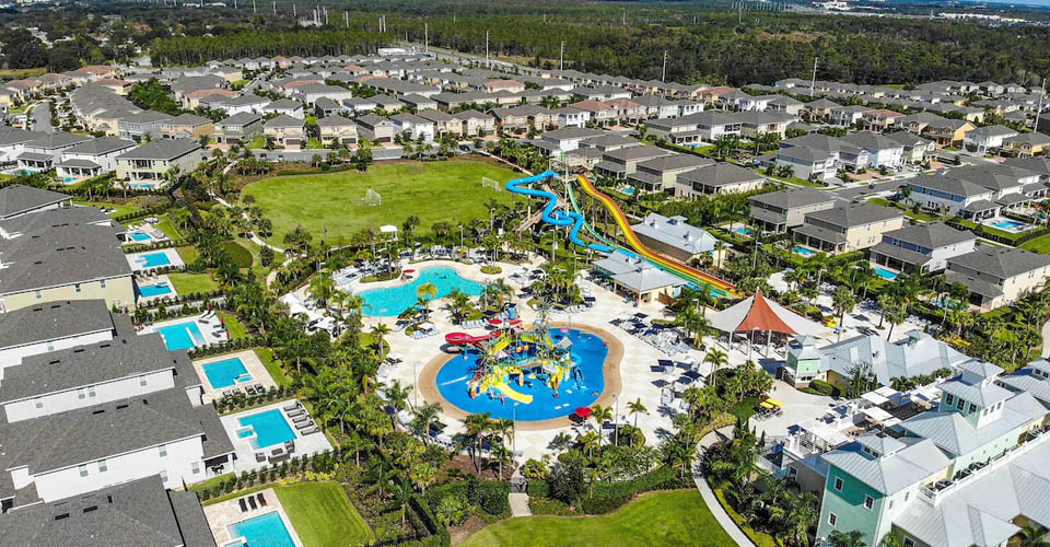 Aerial View of the water park, vacation homes, and clubhouse at the Encore Resort in Renunion Fl 960