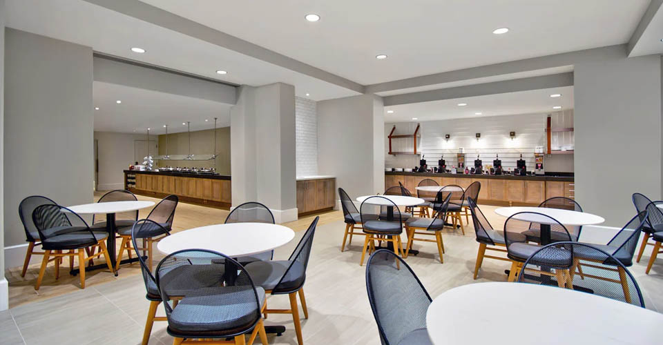 Breakfast area wth plenty of seating at Residence Inn at Flamingo Crossing in Orlando 960