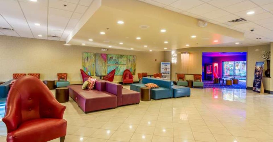 Lobby with colorful seating at the Coco Key Orlando Resort 960