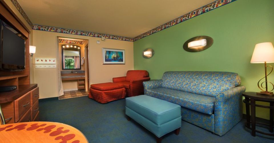 Living Room with 2 sleeper sofas in the family suite at the All Star Music Resort at Disney World 960