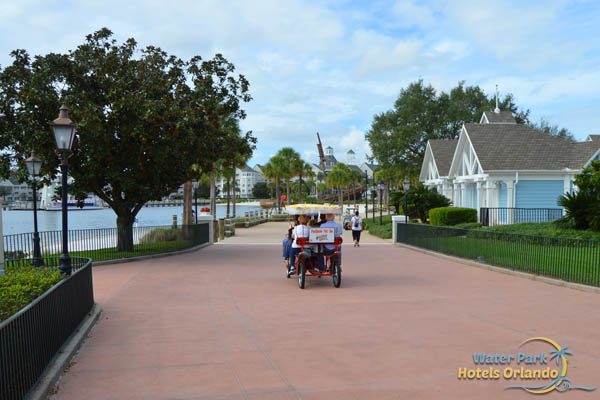 Surrey bike on the walking path of Disney's Beach Club Resort 600