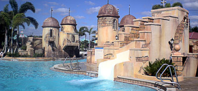 Water slide built into an outer town wall at the Disney Caribbean Resort