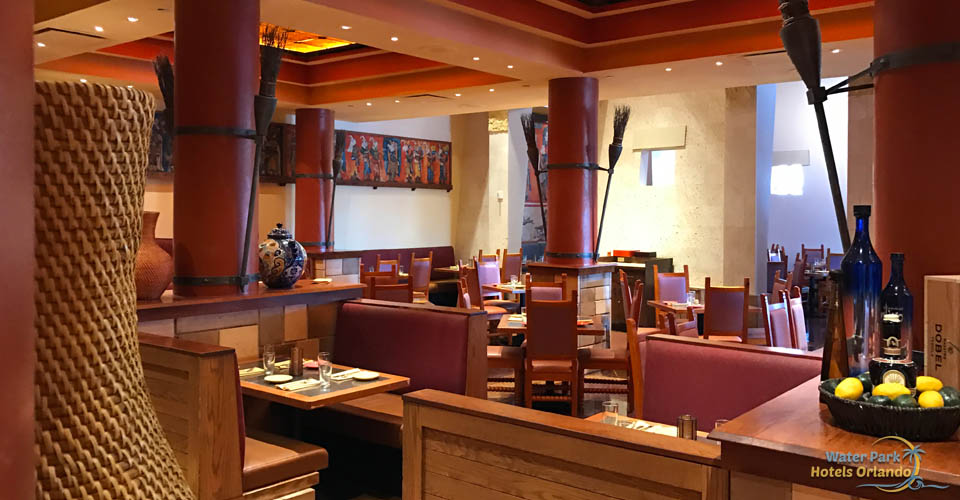 Comfortable booths or table seating arranged in the Mayan Grill at the Disney Coronado Springs Resort 960