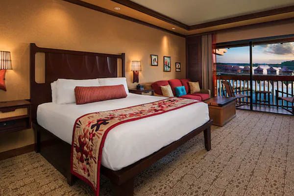Studio view with queen bed overlooking Seven Seas Lagoon at DVC Studio Villas at Disney Polynesian Resort 600