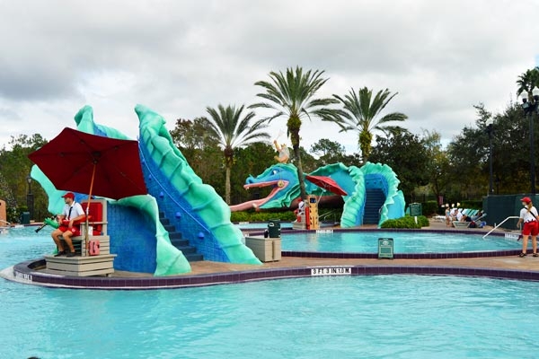 View of the main pool area with Serpent Water Slide at the Disney New Orleans Resort French Quarter 600