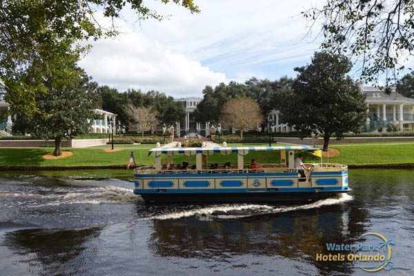 Water Taxi cruising along in front of the Stately Mansions at the Disney Port Orleans Riverside Resort 600
