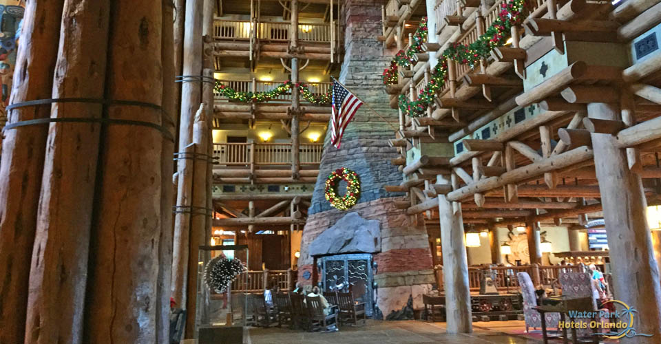 Christmas Wreath over the large fireplace at the bridge in the lobby at the Disney Wilderness Lodge Resort 960