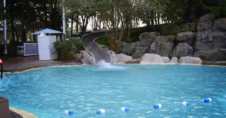 230 Foot water slide at Stormalong Bay Disney Yacht Club splash down in the main pool