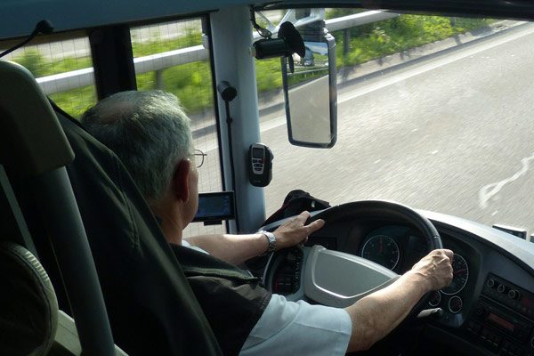 Bus Driver on the road taking guests to Disney World 600