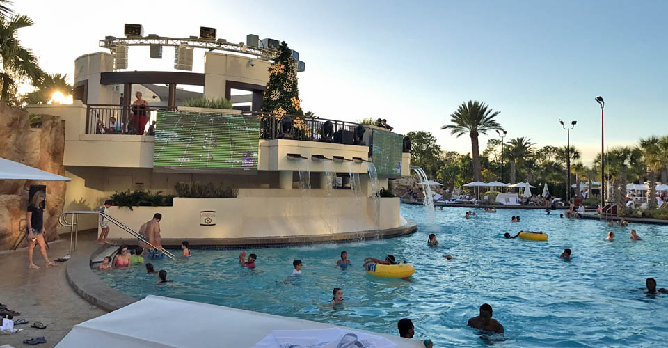 Falls Lagoon Pool with large screens at World Center Marriott Orlando