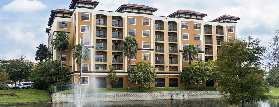 Floridays Resort Orlando View of 6 Story Building overlooking lake wide