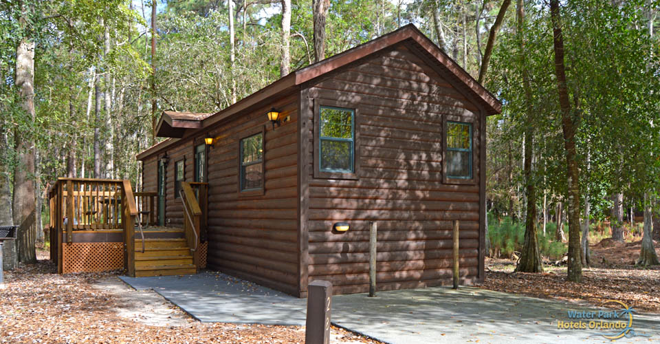 Cabin with porch and driveway at the Disney Fort Wilderness Campground 960