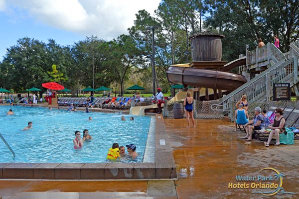 Meadows Family Pool with Water Slide in the background at the Disney Fort Wilderness Campground 960
