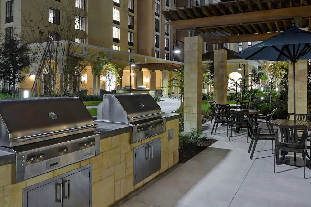Grilling Stations and outdoor seating at the Home2 Suites in Flamingo Crossing a Hilton Hotel 1000