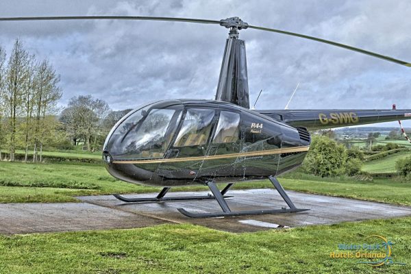 Tour Helicopter on landing pad in a field 1000
