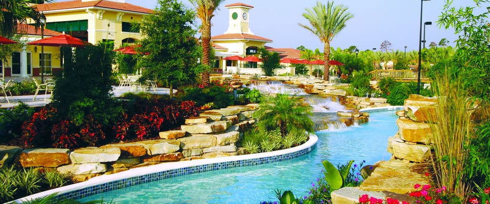 View of a section of the 1,200 foot Lazy River with Rock Water Fall at the Holiday Inn Orange Lake Resort in Orlando Fl 960