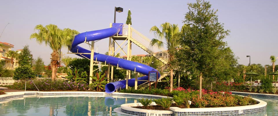 Known as one of the best Orlando Hotels with Water Slides, View of a 1 of the large, enclosed water slides at the Holiday Inn Orange Lake Resort in Orlando Fl 960