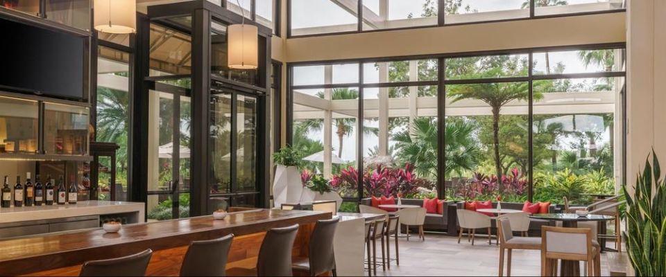 View of the 18th floor Trellesis Lounge with huge open glass to the outdoors at the Grand Cypress Hyatt Orlando