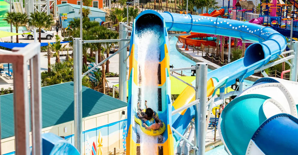 Fun on a tube on the upward jets of the water coaster Follow Me Falls water slide at the Island H2O Live Water Park in Orlando 960