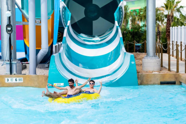 Gliding across the pool of water at the end of the Reload Rapids water slide at the Island H2O Live Water Park in Orlando 1000