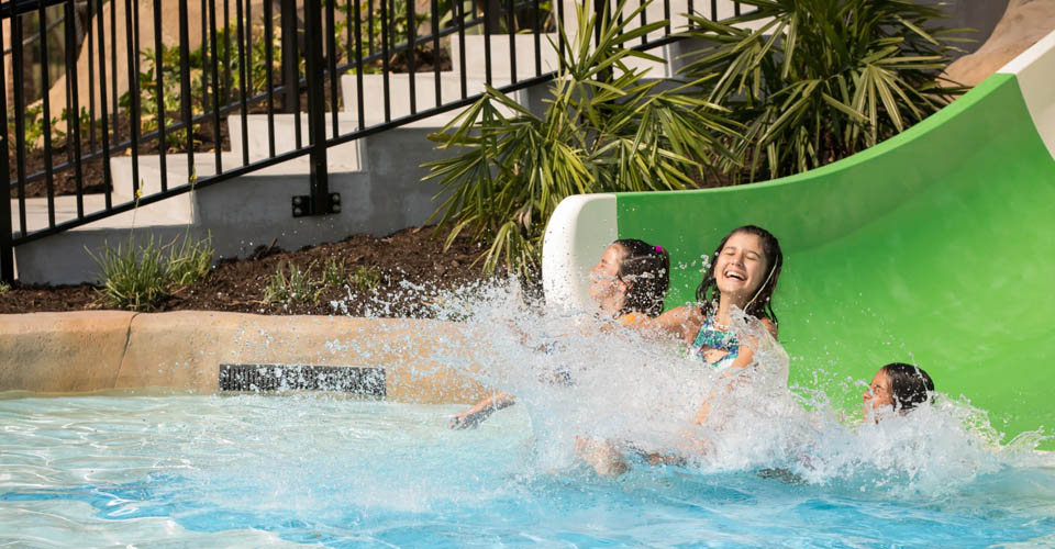 Wide small water slide with room for multiple kids at the Cand Stripe Cove at the Island H2O Live Water Park in Orlando 960