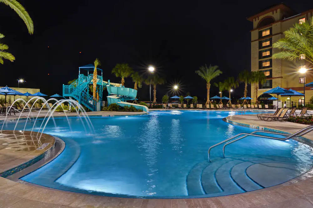 Large Outdoor Pool with Watre Slide at the Home2 Suites in Flamingo Crossing a Hilton Hotel 1000