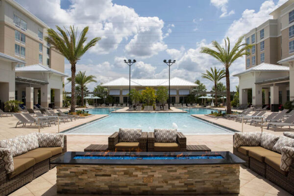 Comfortable seating around the firepit at the pool Springhill Suites at Flamingo Crossing 1000