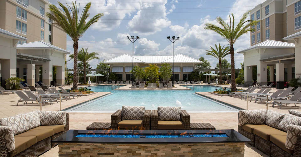 Comfortable seating around the firepit at the pool Springhill Suites at Flamingo Crossing 960