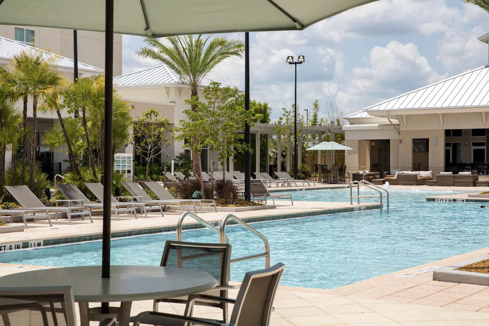 TownePlace Suites At Flamingo Crossing Recreation   Large Pool Seating Springhill Suites Flamingo Crossing 1000 