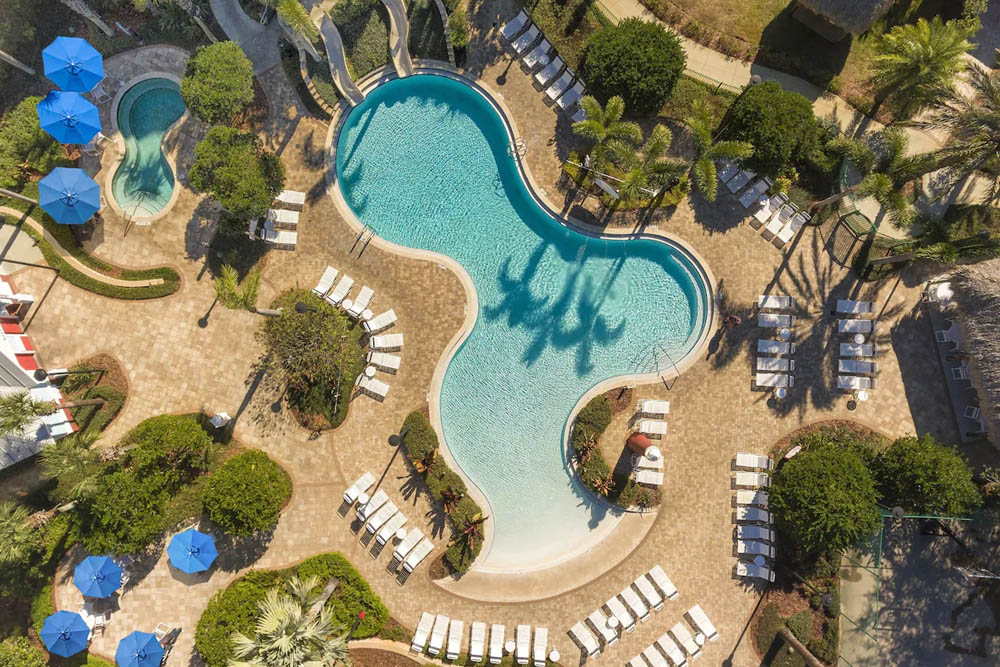 Top view of the pool with zero entry and 2 small water slides  at the Holiday Inn Express South Lake Buena Vista 1000