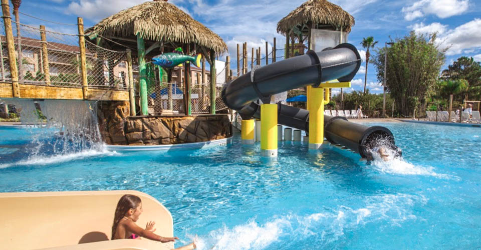 Enclosed twisting water slide at the Liki Tiki Resort Orlando Fl 960