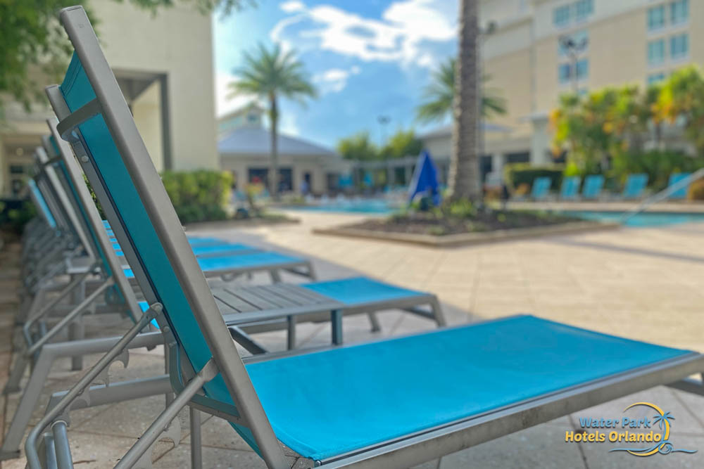 Lounge chairs at the Outdoor pool TownPlace Suites in Flamingo Crossing 1000
