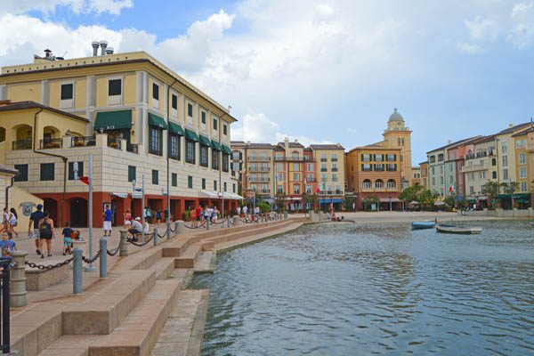 Bay with boats and people on the walkway at the Loews Portofino Bay Hotel in Orlando 600