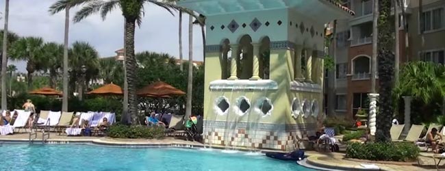 Sounds of the waterfall can be heard while relaxing by the Outdoor Heated Pool at the Marriott Grande Vista Resort in Orlando