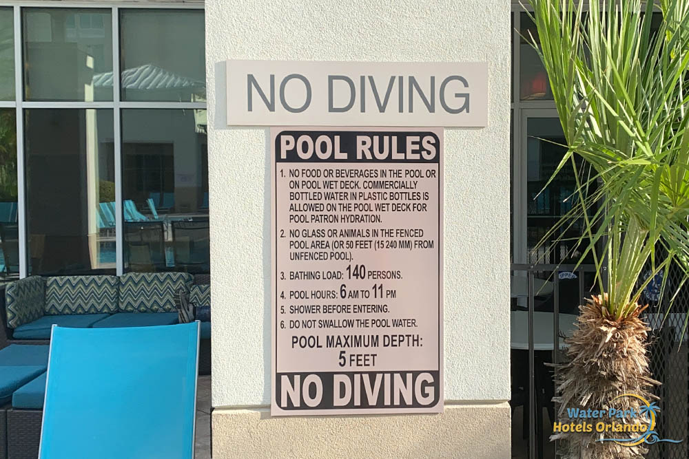 Posted Pool rules at the Outdoor pool TownPlace Suites in Flamingo Crossing 1000