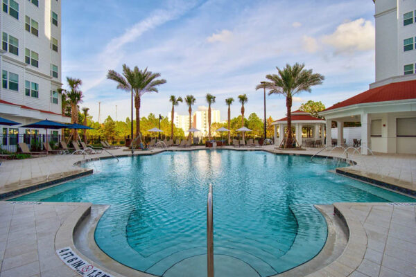 Pool view with fountains and sun deck at the Residence Inn at Flamingo Crossing in Orlando Florida 1000