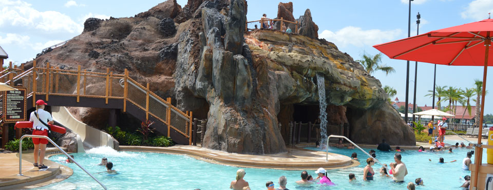Large Swimming Pool wiht Volcano Water Slide at the Disney Polynesian Village Resort Orlando