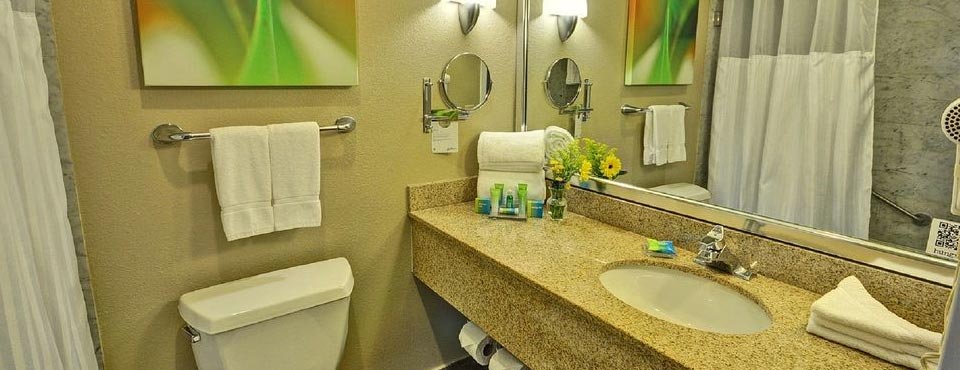Bathrooms come with granite top sink and tub / shower unit at the Grand Resort Orlando Celebration