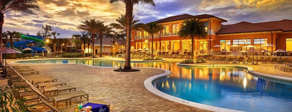 View of a beautiful evening by the pool at the Regal Oaks Resort CLC in Kissimmee Fl 960