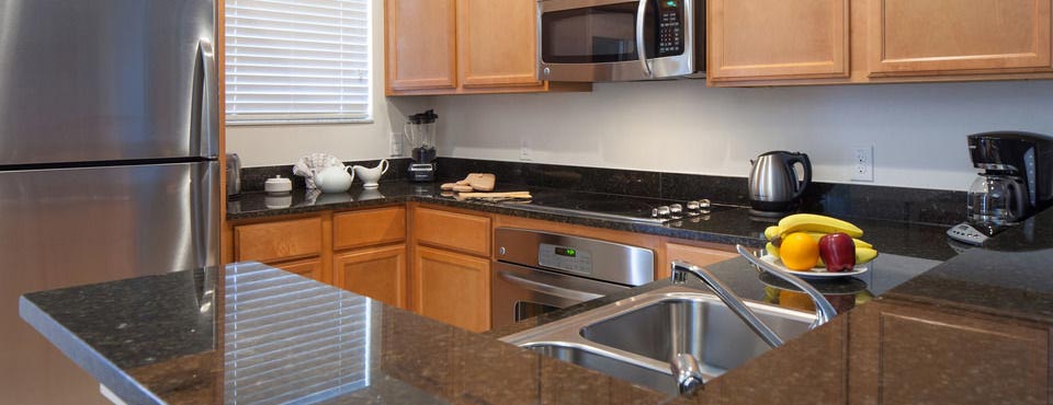 Full size kitchen in a 3 bedroom townhouse at the Regal Oaks Resort CLC in Kissimmee Fl 