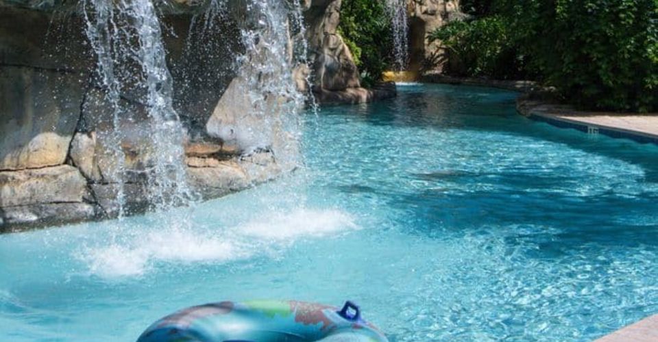 A waterfall while floating on the lazy river at Reunion Resort in Orlando Fl 960