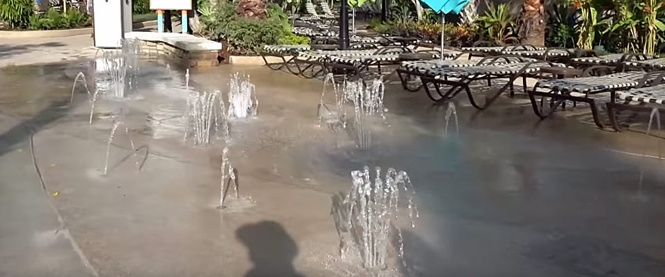 View of the Pop Fountains in the Sidewalk around the Pool at the Loews Sapphire Falls Resort in Orlando 960