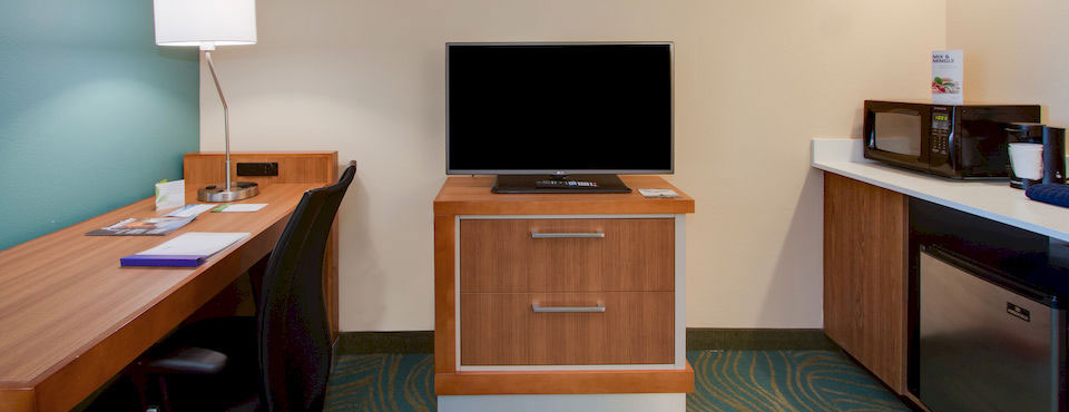 Mini-fridge and Microwave and desk in cubby at the Springhill Suites in Kissimmee Fl