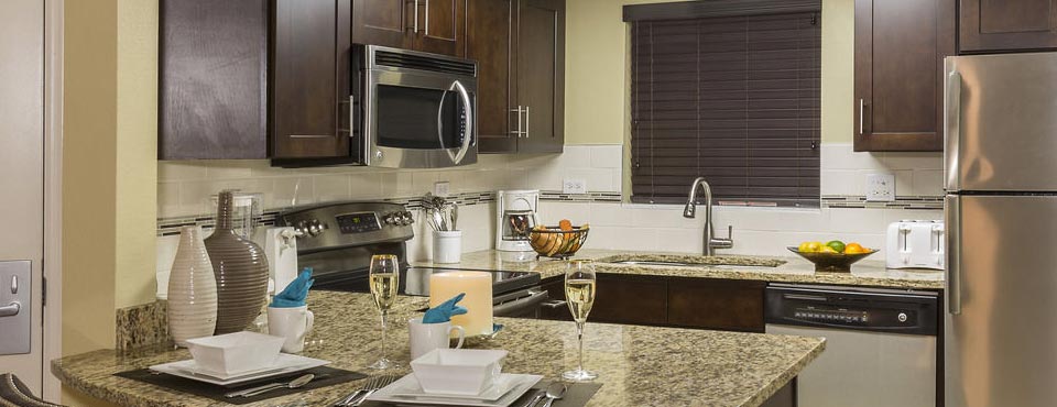 Condo with full-size Kitchen, Refrigerator, Stove, Dishwasher and Microwave with Granite Counters at the Summer Bay Resort in Orlando Fl