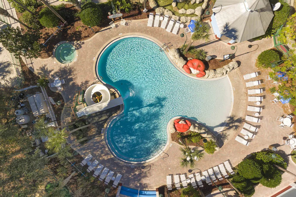 Top down view of the kids pool with crabs, water slide and zero entry at the Holiday Inn Express South Lake Buena Vista 1000