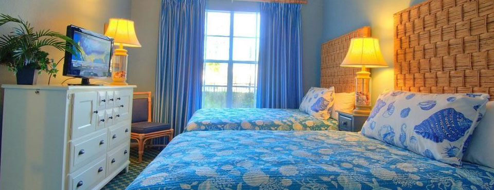 View of a Two Bedroom Villa 2nd Bedroom with Double Beds at the Calypso Cay Vacation Villas Resort in Kissimmee Fl